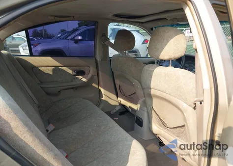 2001 Hyundai Elantra Gls z USA, uszkodzony, nr VIN KMHDN45DX1U150063